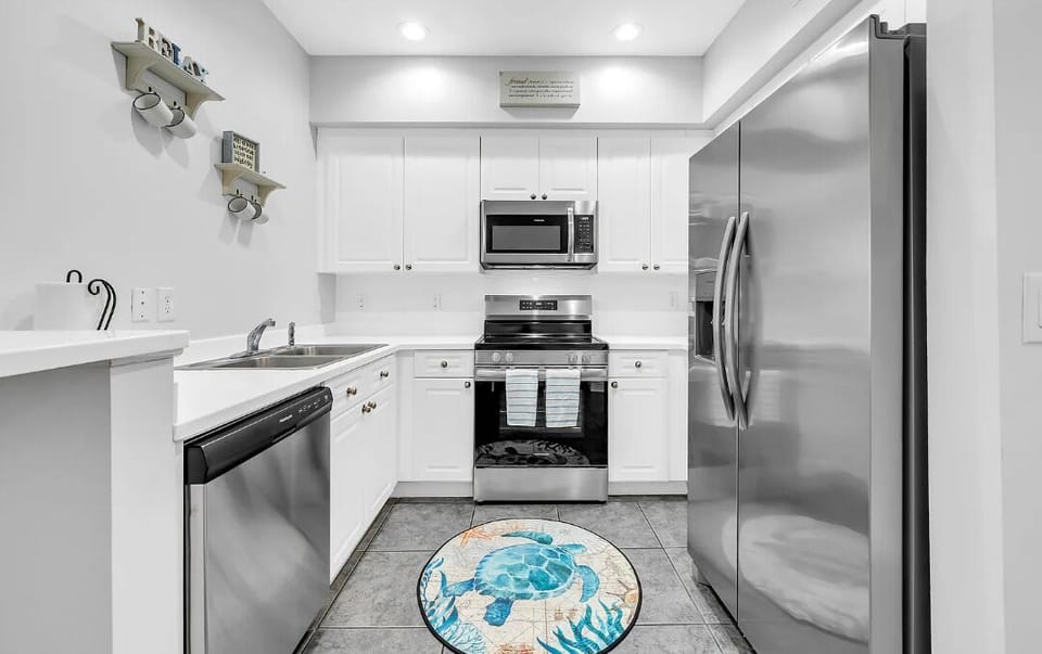Condo, Multiple Beds (The Village 411) | Private kitchen