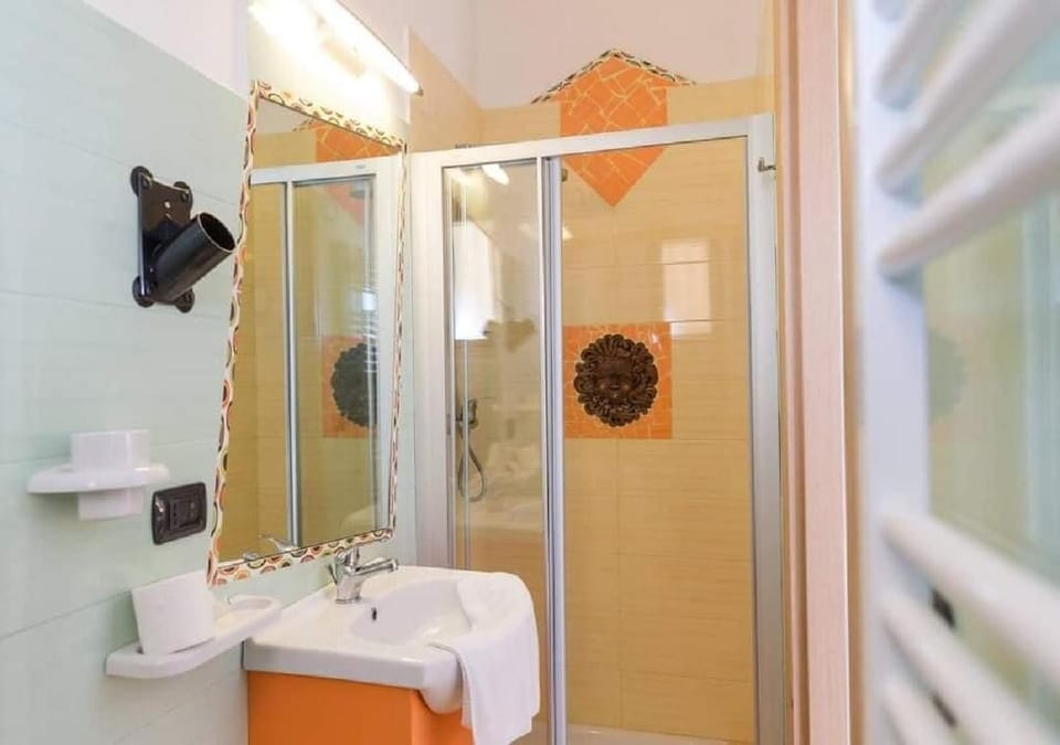 Shower, bathrobes, bidet, towels