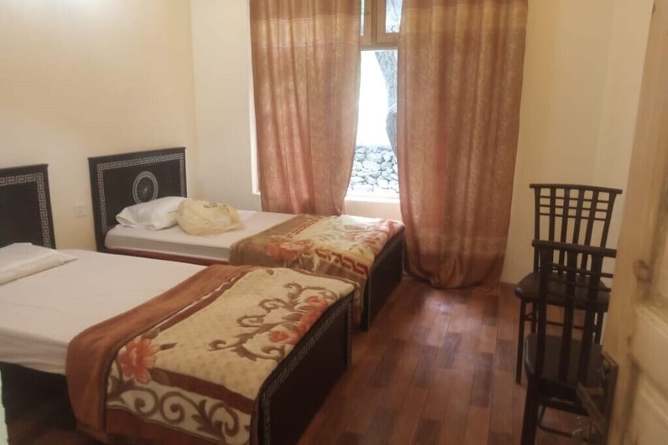 Deluxe Double Room, Mountain View | Soundproofing, iron/ironing board (on request), WiFi (free)