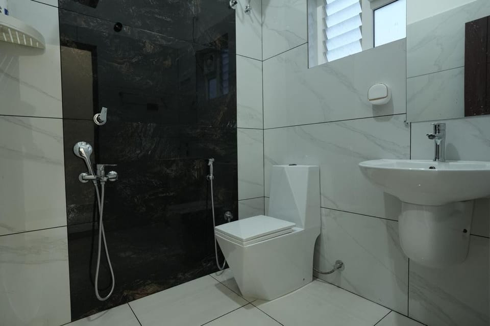 Luxury 2 Bhk Apartment | Bathroom | Bathrobes, slippers, bidet