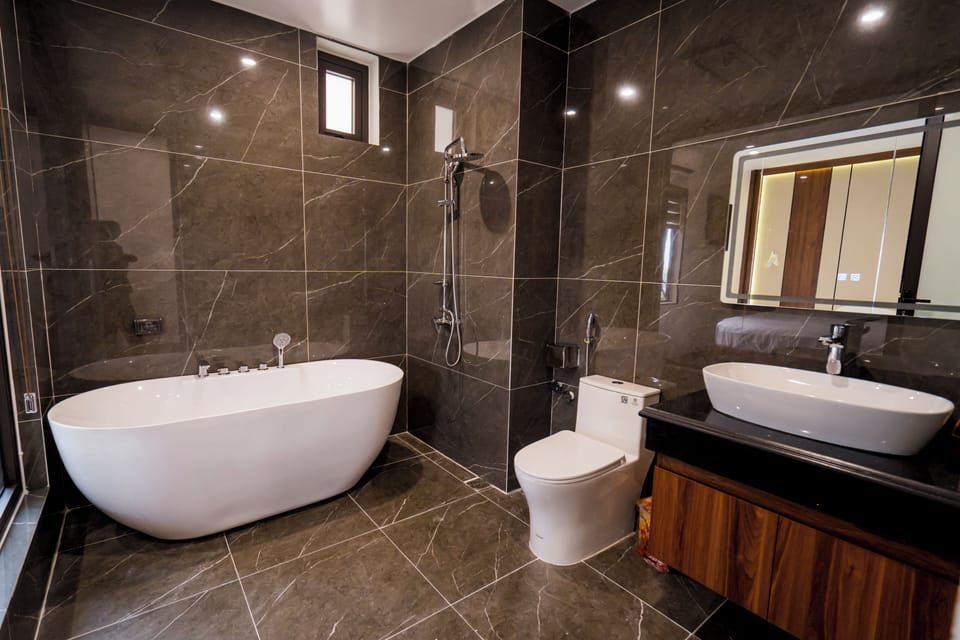Luxury Double Room Single Use, 1 Bedroom | Bathroom | Shower, hair dryer, towels, soap