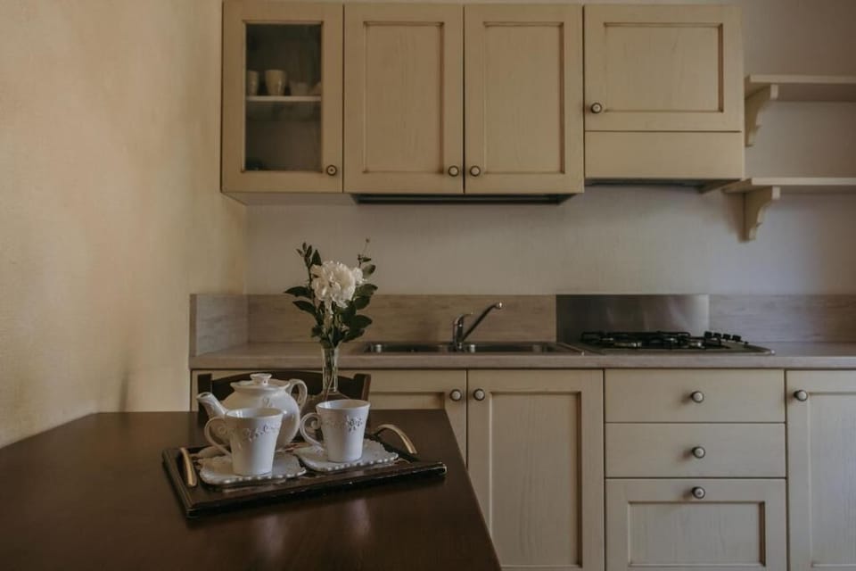 Classic Apartment, Garden View | Private kitchen | Highchair
