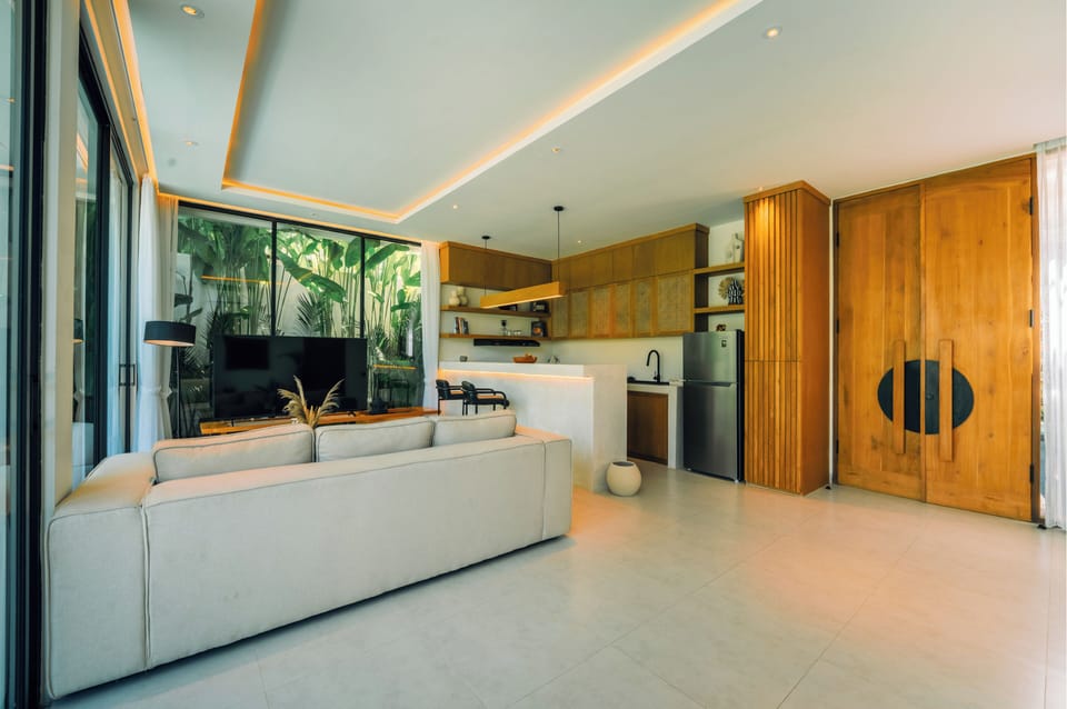 Luxury Villa, Non Smoking, Garden View | Living area | 52-inch LCD TV with digital channels, books