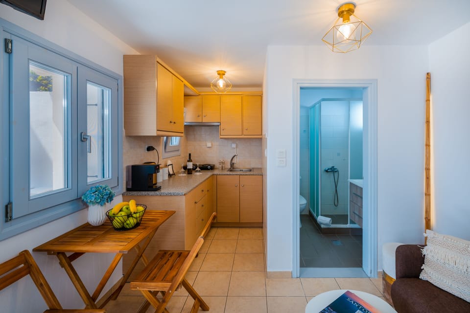 Split-Level Residence | Private kitchen | Fridge, espresso maker, coffee/tea maker, electric kettle