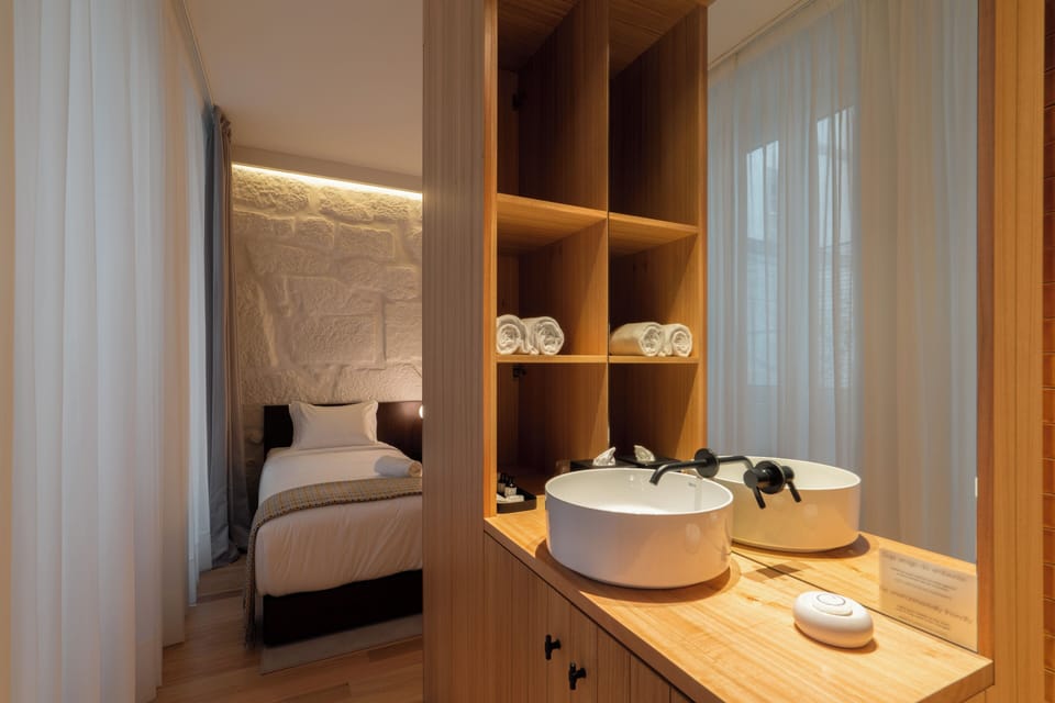 Shower, hair dryer, slippers, towels