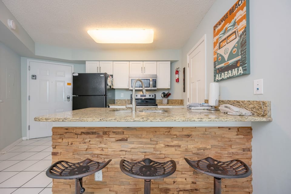 Condo, 2 Bedrooms | Private kitchen | Coffee/tea maker, fridge, oven