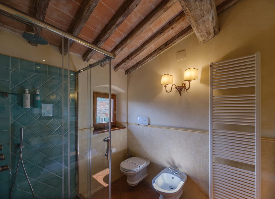Junior Suite | Bathroom | Hair dryer, slippers, towels, soap