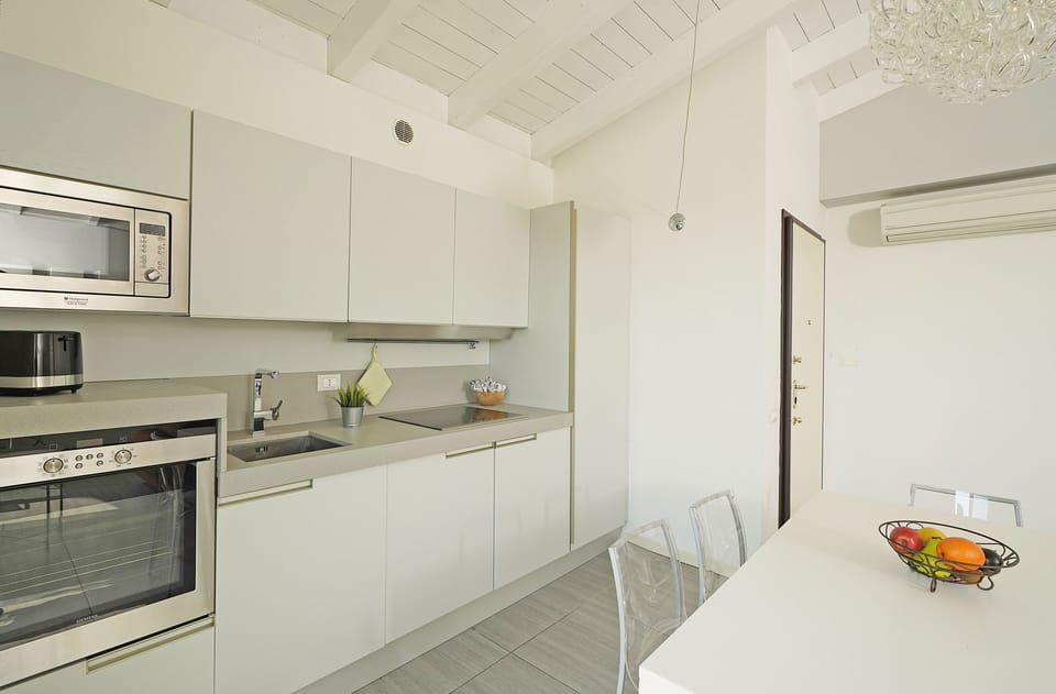 Apartment, Balcony | Private kitchen | Espresso maker, electric kettle