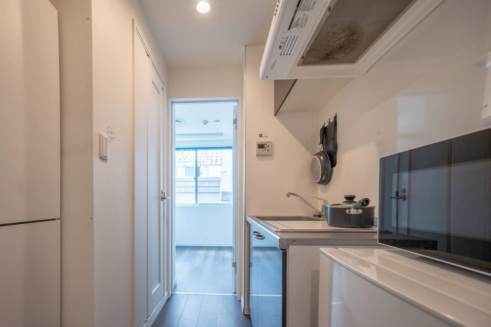 Economy Apartment, 1 Double Bed, Private Bathroom | Private kitchen | Mini-fridge, microwave, stovetop, cookware/dishes/utensils