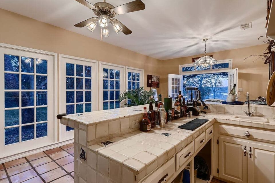 House, Multiple Beds, Pool Access, Pool View (Hill Country Retreat: Pool | Hot Tub ) | Private kitchen | Dining tables