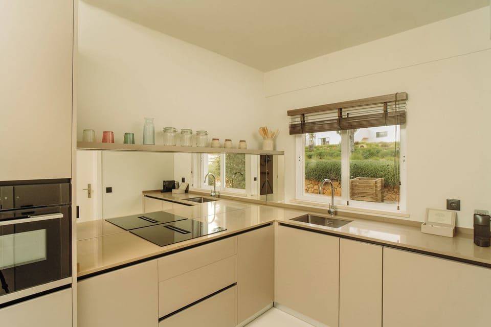 Family Apartment, 2 Bedrooms | Private kitchen | Coffee/tea maker, eco-friendly cleaning products