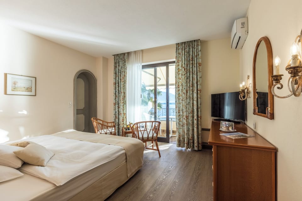 Basic Double or Twin Room, Lake View | In-room safe, Internet, alarm clocks