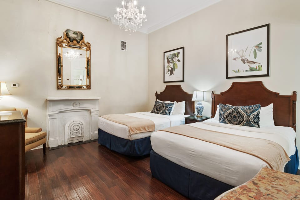 Standard Room - Two Queen Beds | Premium bedding, blackout drapes, iron/ironing board, free WiFi