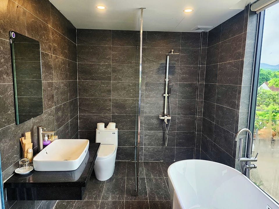 Family Double or Twin Room, Balcony, Mountain View | Bathroom | Combined shower/tub, hair dryer, towels, soap
