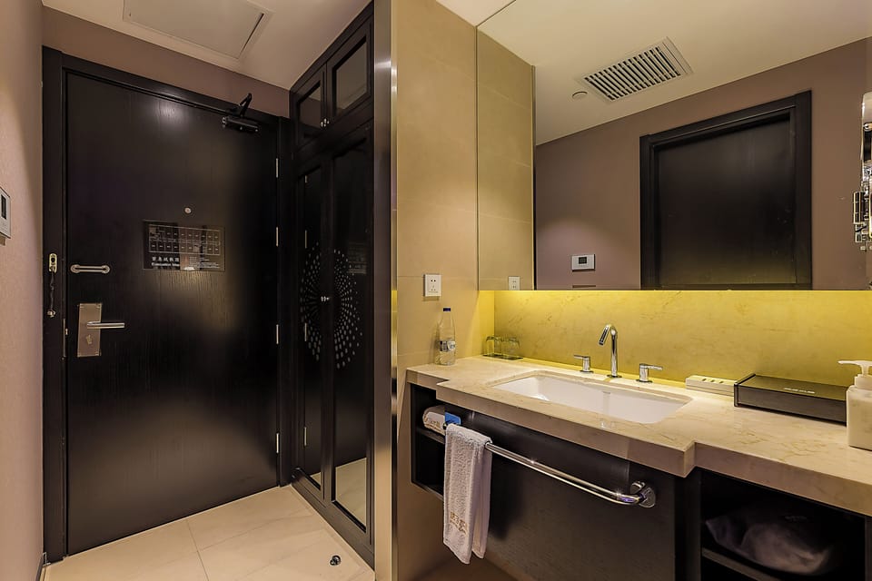 Basic Twin Room, Multiple Beds, Housekeeping, City View | Bathroom | Shower, hair dryer, slippers, towels