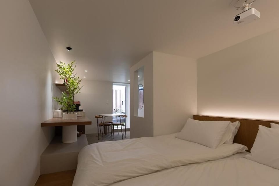 Luxury Suite, Balcony, City View | Blackout drapes, soundproofing, free WiFi