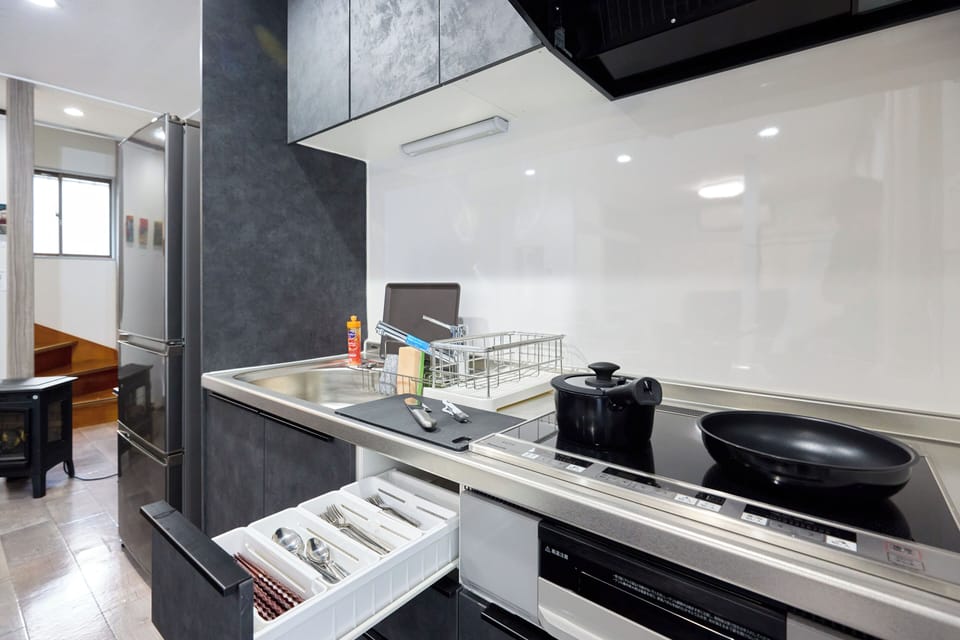 Family House, 2 Bedrooms, Non Smoking | Private kitchen | Full-size fridge, microwave, stovetop, cookware/dishes/utensils