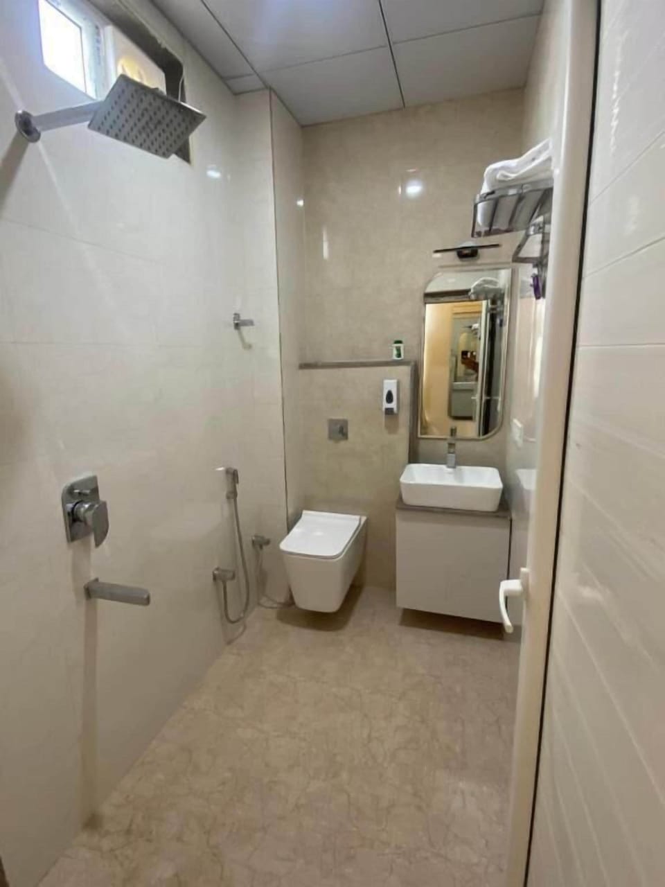 Bidet, towels, soap, shampoo