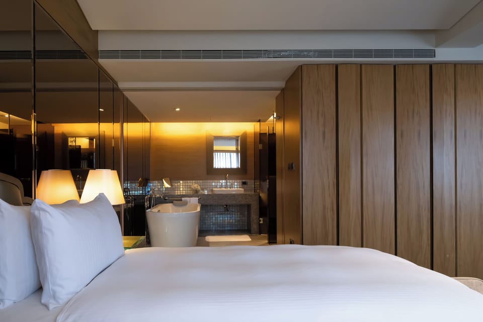 Corner Suite | Premium bedding, down comforters, minibar, in-room safe