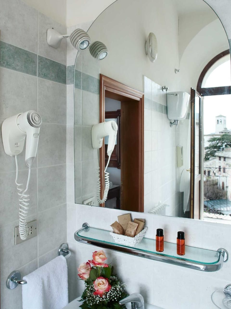 Hair dryer, bidet, towels, soap