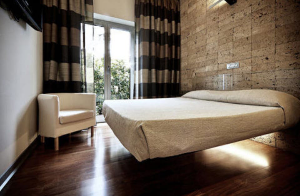 Deluxe Double or Twin Room | Minibar, in-room safe, desk, blackout drapes