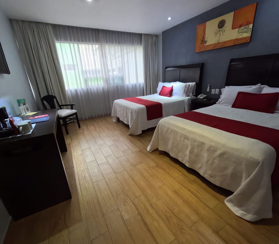 Standard Quadruple Room, 2 Double Beds | In-room safe, individually decorated, individually furnished, desk
