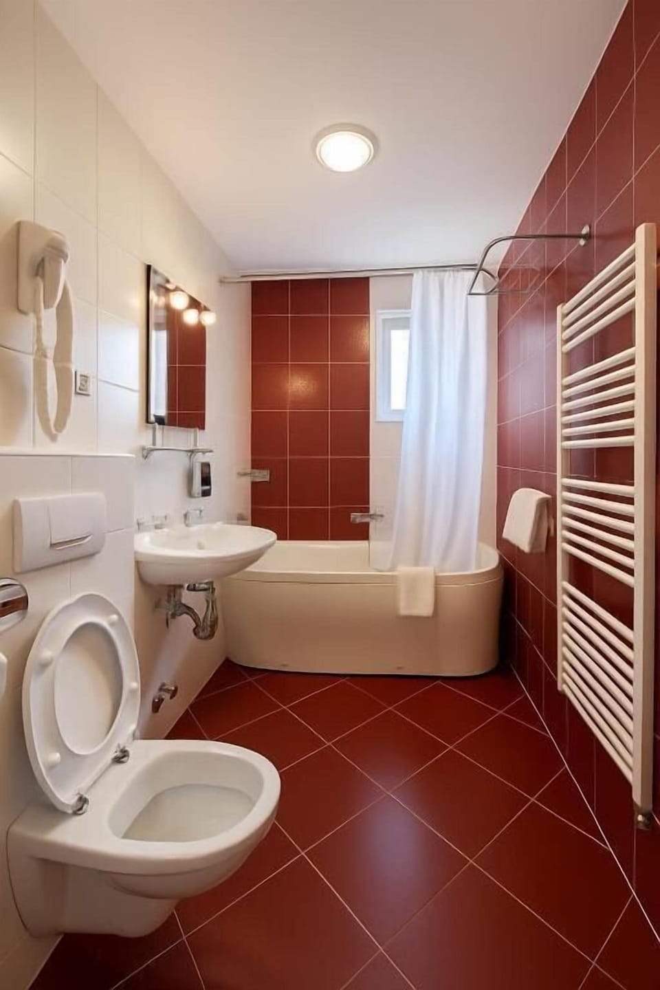 Bathtub, hair dryer, towels, soap