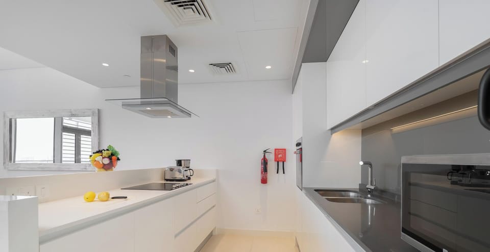 Luxury Apartment, Balcony, Sea View | Private kitchen | Electric kettle, toaster oven, freezer, dining table