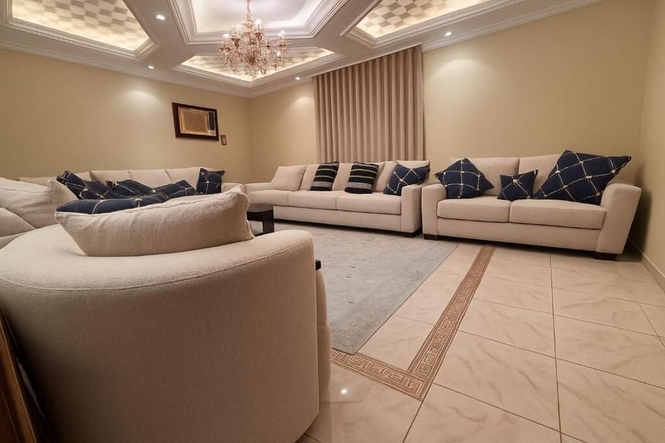 Superior Apartment, Balcony, City View | Living area | 70-inch Smart TV with digital channels