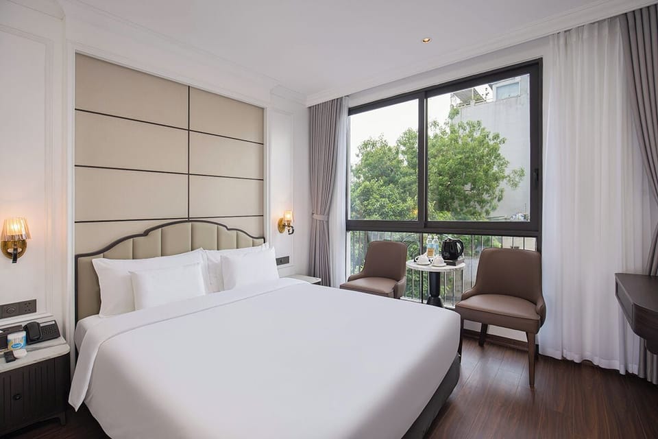 Deluxe Double Room | Minibar (some free items), in-room safe, travel crib, WiFi (free)