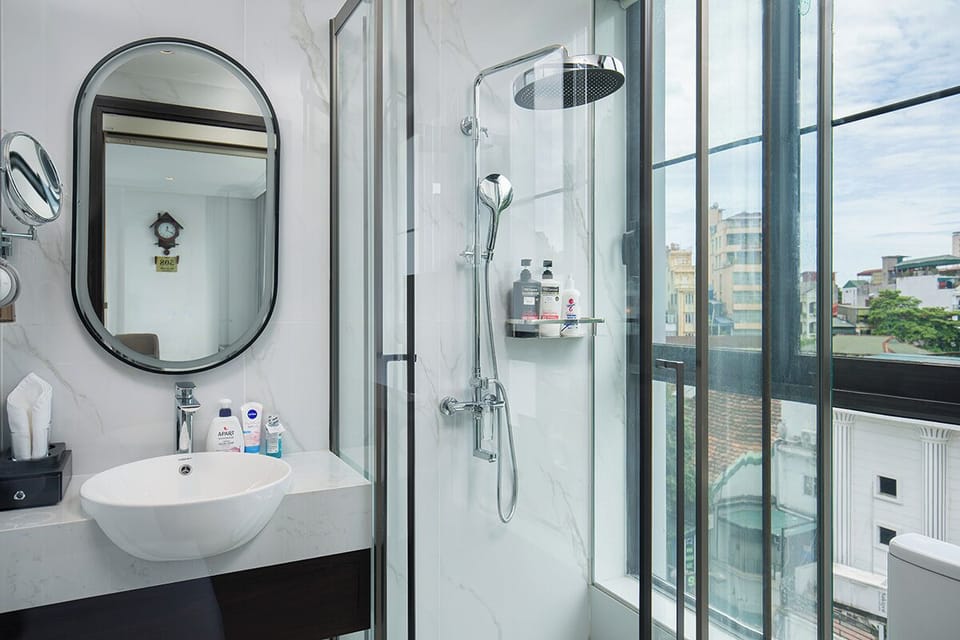 Premium Twin Room | Bathroom | Hair dryer, slippers, towels, soap