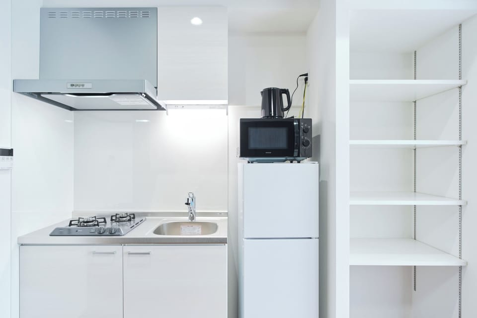 Fridge, microwave, stovetop, cookware/dishes/utensils