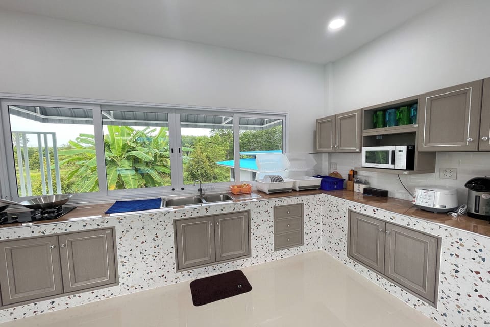 Villa | Private kitchen | Shared fridge, microwave, electric kettle