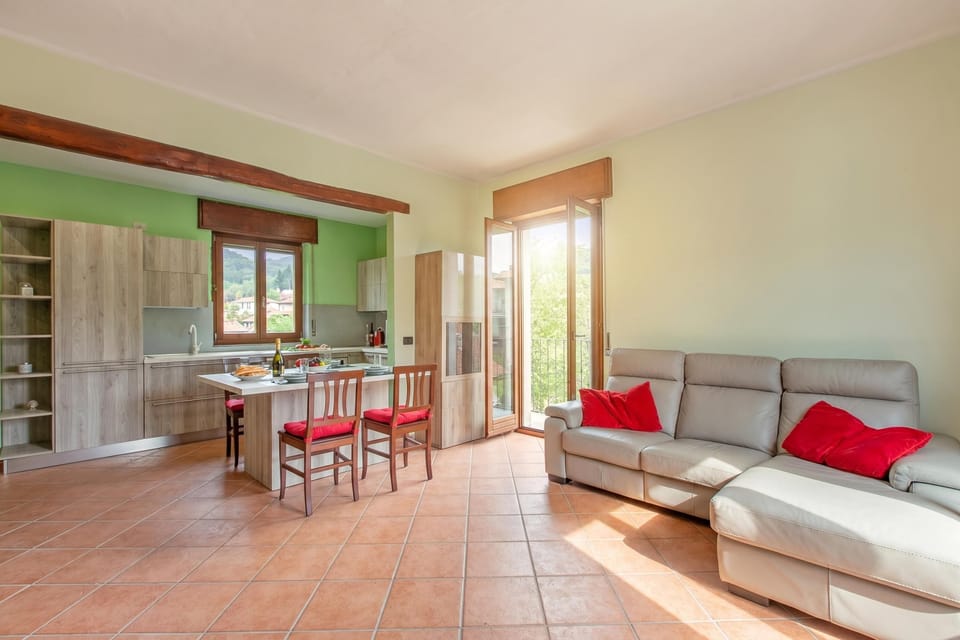 Family Townhome, Multiple Bedrooms (La Dimora Dei Colori Private Garden) | Living area | Flat-screen TV, fireplace