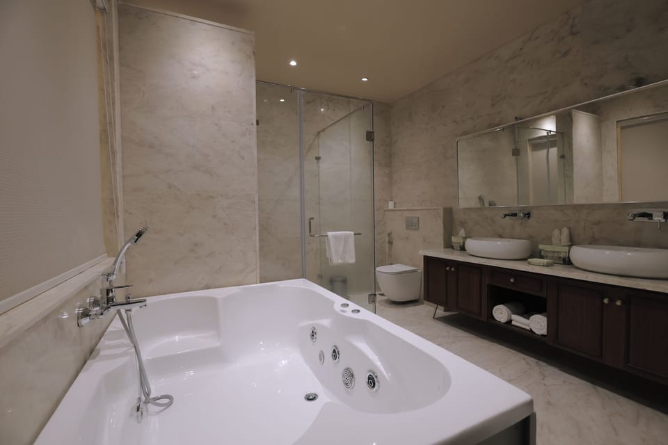 Suite, Balcony, Hill View | Bathroom | Shower, hair dryer, slippers, towels