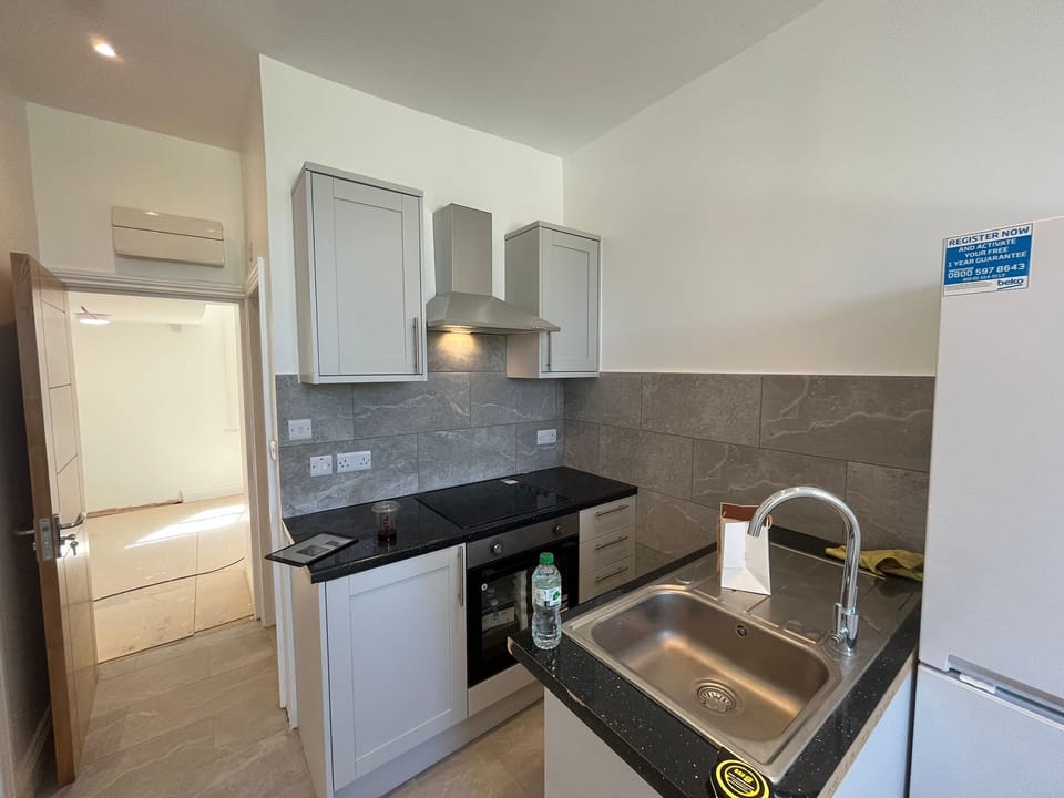 Comfort Apartment | Private kitchen | Full-size fridge, microwave, oven, stovetop