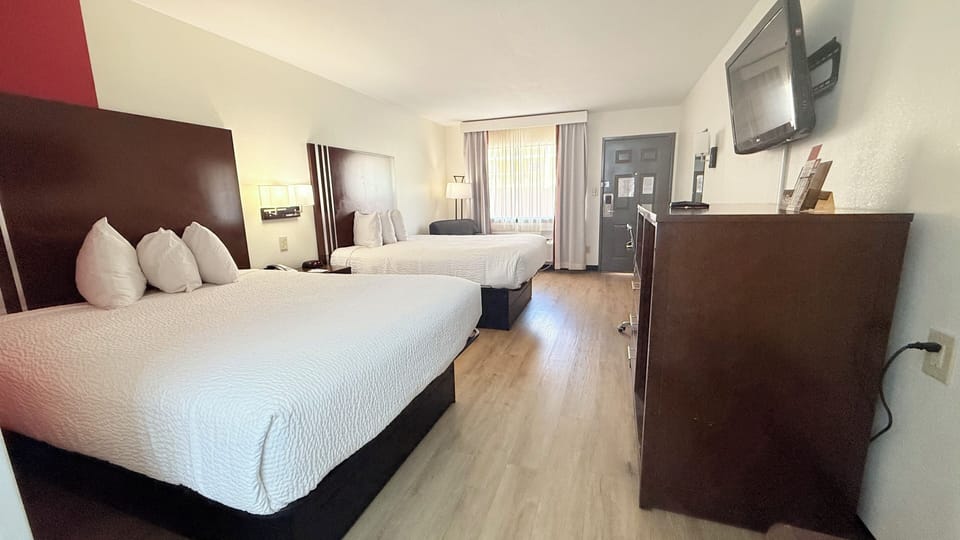 Deluxe Room, 2 Queen Beds | In-room safe, laptop workspace, blackout drapes, iron/ironing board
