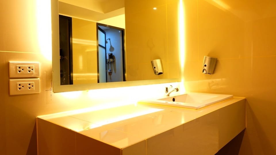 Family Room, 2 Double Beds | Bathroom sink
