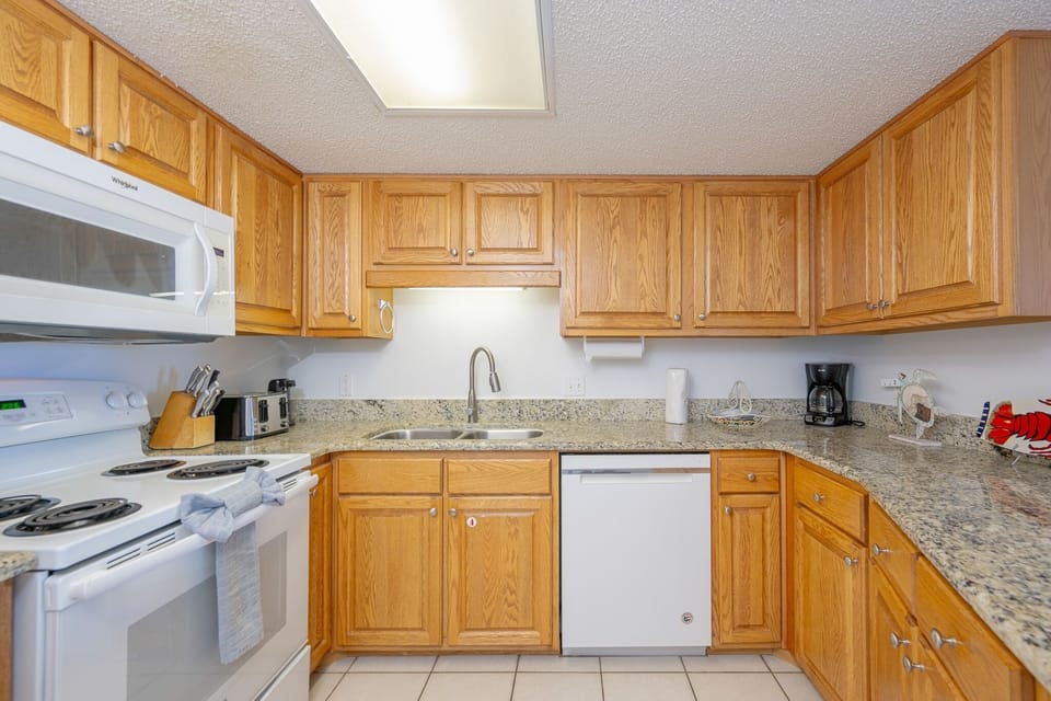 Condo, 2 Bedrooms | Private kitchen | Coffee/tea maker, fridge, oven