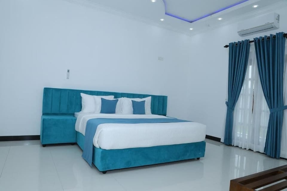Deluxe Double Room, Balcony, Garden View | Laptop workspace, free WiFi