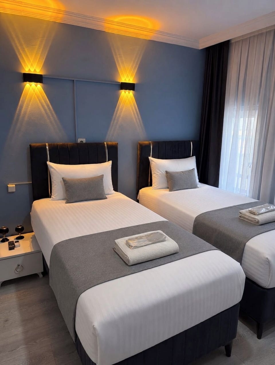Deluxe Quadruple Room, Non Smoking | Desk, laptop workspace, soundproofing, free WiFi