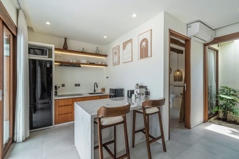 Deluxe Villa, 2 Bedrooms | Private kitchen | Fridge, stovetop, toaster, cookware/dishes/utensils