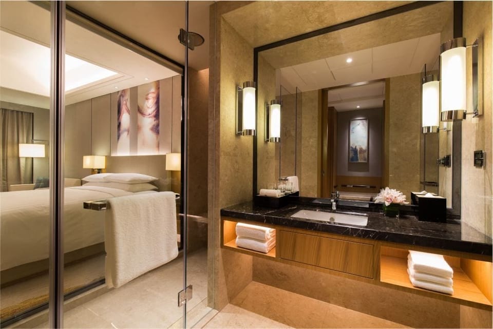 Basic Single Room, City View | Bathroom | Shower, hair dryer, slippers, towels