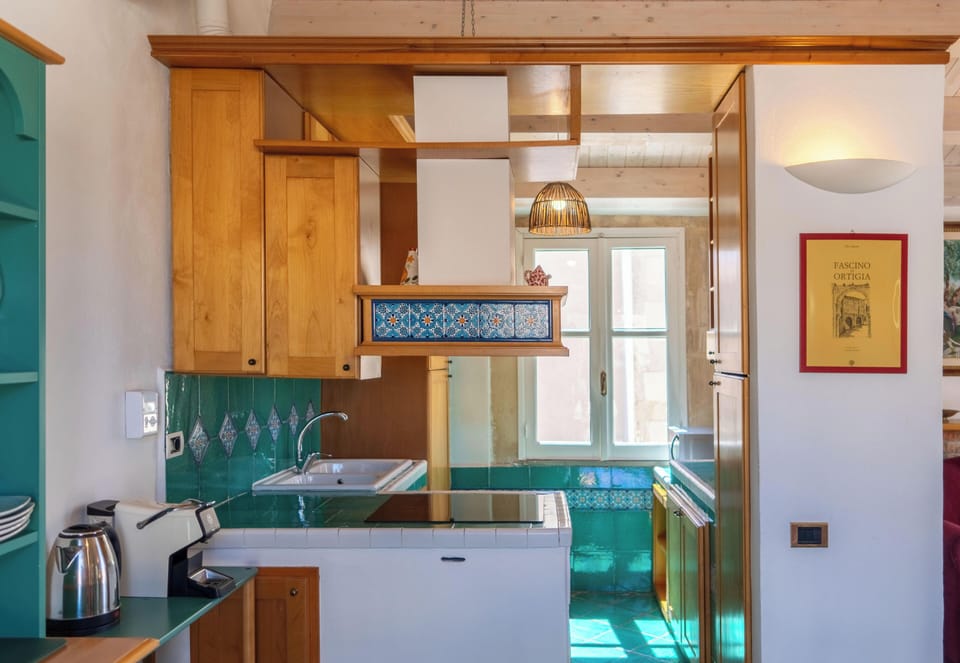 Comfort Apartment, Sea View | Private kitchen | Full-size fridge, microwave, stovetop, espresso maker