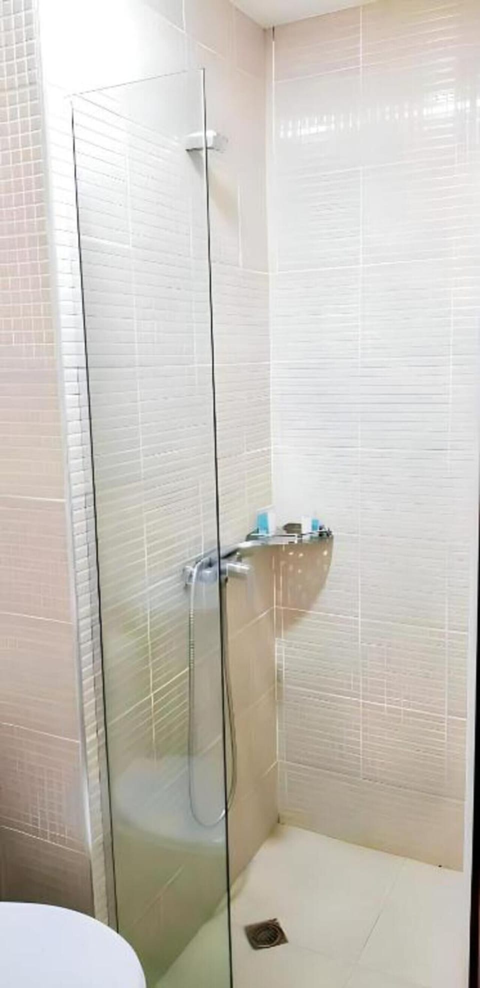 Shower, hair dryer, slippers, soap