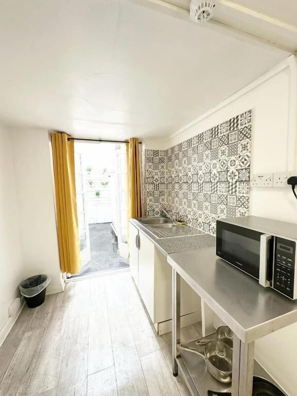 Studio, Patio | Private kitchen