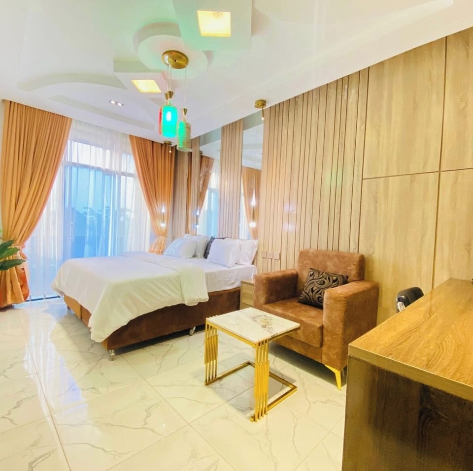 Family Room, Balcony, City View | Desk, laptop workspace, blackout drapes, soundproofing