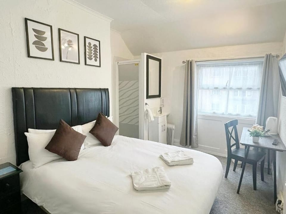 Double Room, City View | Iron/ironing board, free WiFi