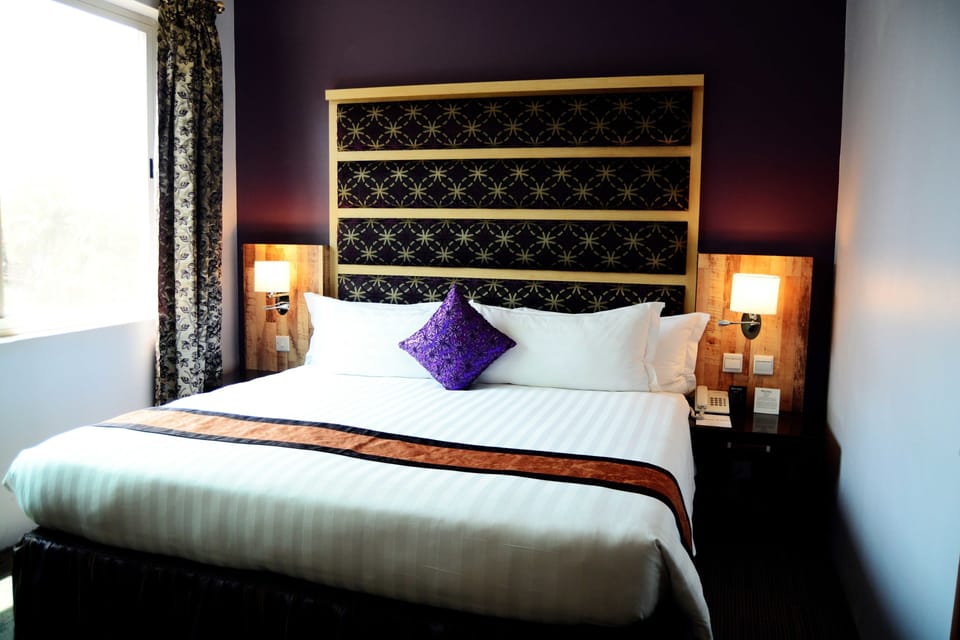 Deluxe Single Suite | 1 bedroom, Egyptian cotton sheets, premium bedding, pillowtop beds