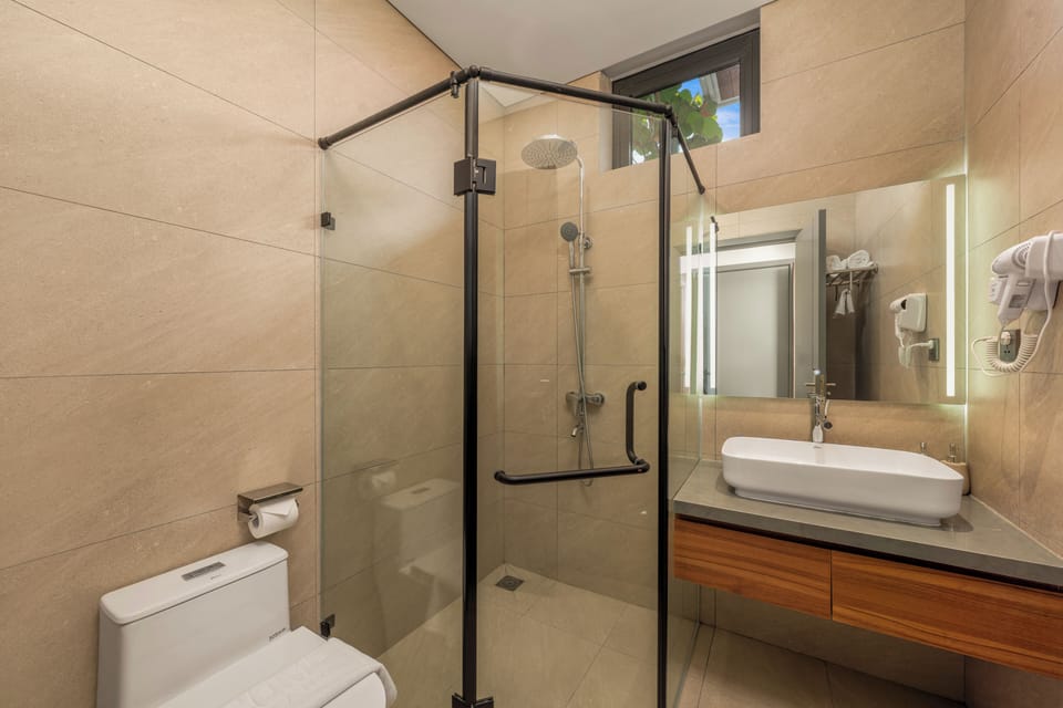 Family Studio, Connecting Rooms, City View | Bathroom | Deep soaking tub, rainfall showerhead, designer toiletries, hair dryer